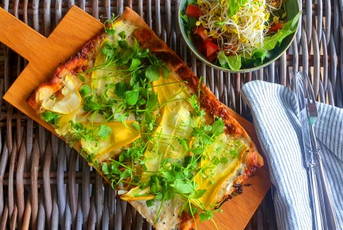 Summer tarte flambée with yellow zucchini