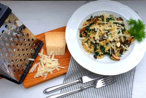 Risotto van venkel met jonge spinazie en paddenstoelen