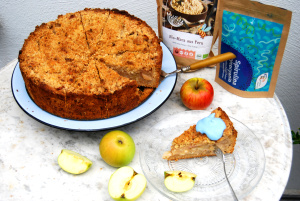 Piece of apple pie with blue spirulina cream