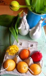 colorful beeswax candles in egg shape