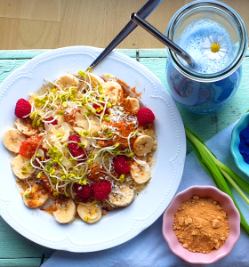 Fresh grain porridge with maca powder & sprouts.