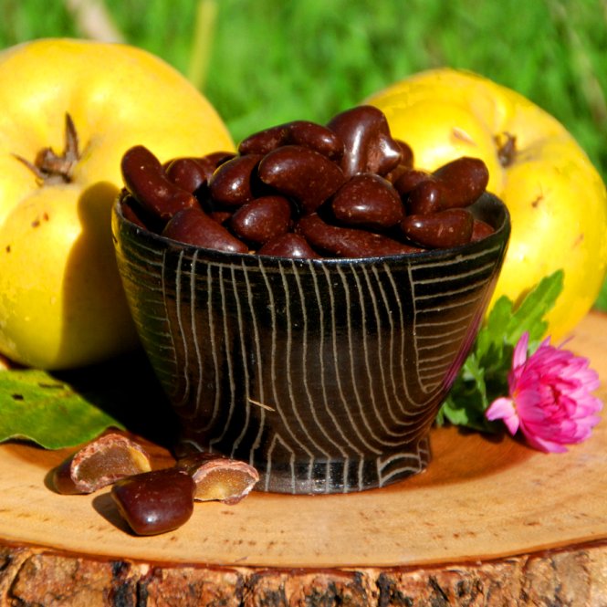 Gekonfijte kweepeer in pure chocolade 100g