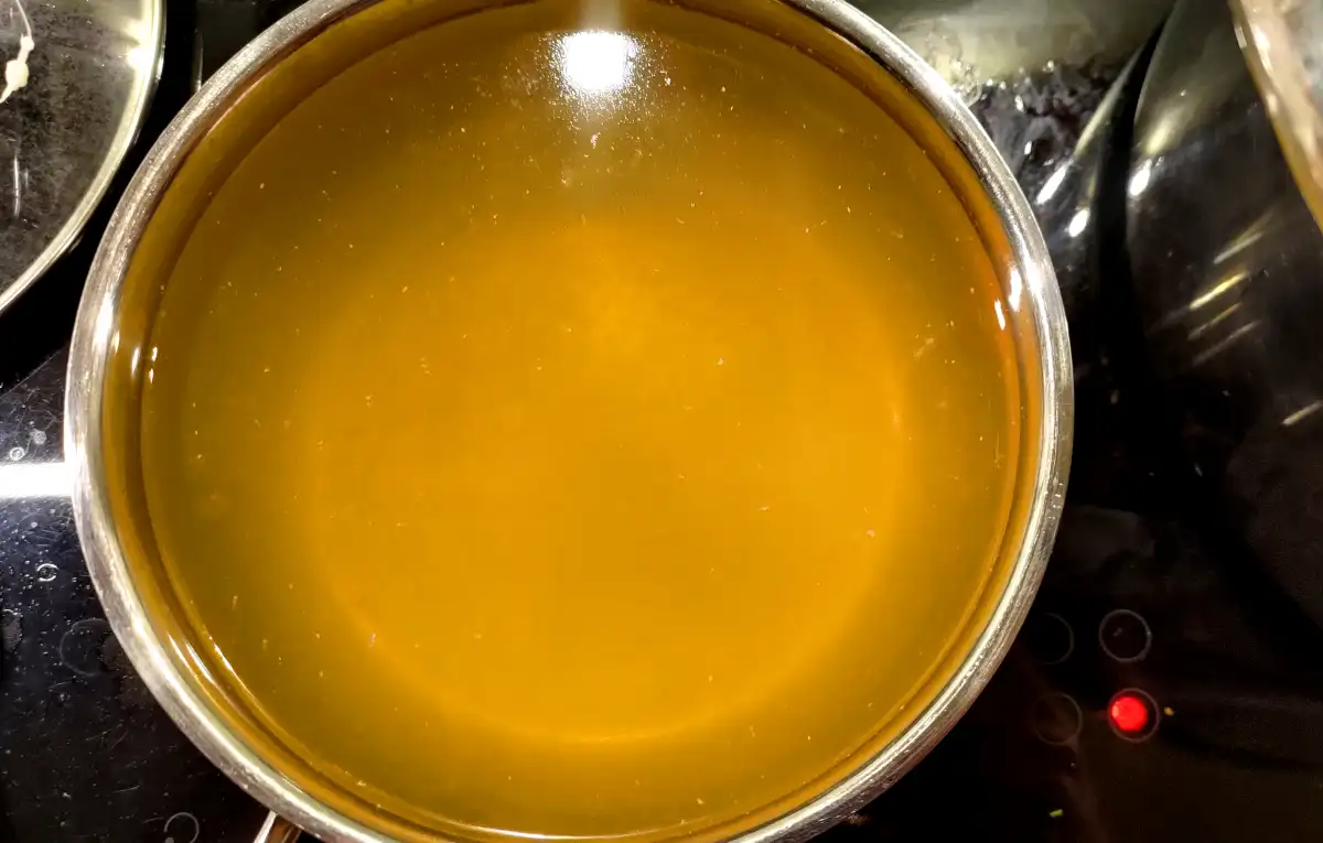 Quince juice in a pot